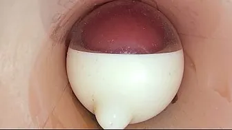 The camera in the deep pussy records a huge ejaculation of sperm into the condom