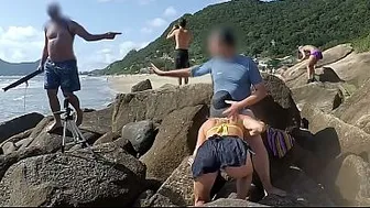 She sucks and fucks in the ass in front of everyone