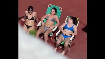 Neighbors sunbathing on the terrace part 2