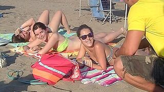 Spanish chicks seduced on a beach